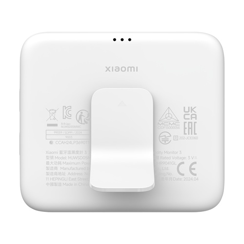 نمای پشت دماسنج و رطوبتسنج شیائومی مدل Smart Temperature and Humidity Monitor 3 با شیارهای تهویه و پایه رومیزی نصبشده